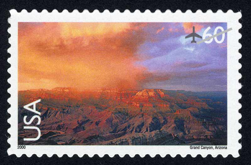 Sixty-cent airmail stamp with mirror image of Grand Canyon